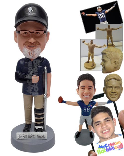 Stuntman wanna be wearing a leg cast and a crutch Personalized Bobblehead