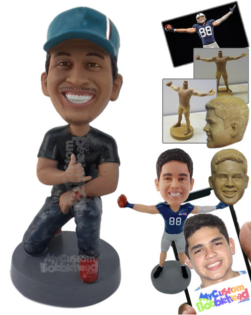 Man Kneeling on One Knee Giving Cool Sign, Wearing a Cap Personalized Bobblehead