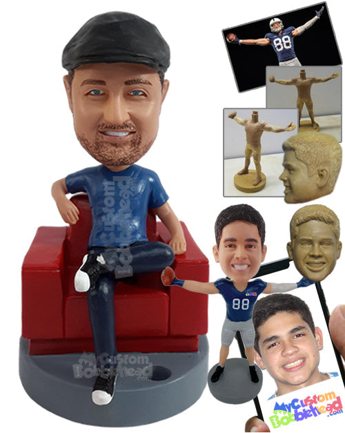 Relaxed guy having a nice day, sitting on the sofa with a pen holder nearby Personalized Bobblehead