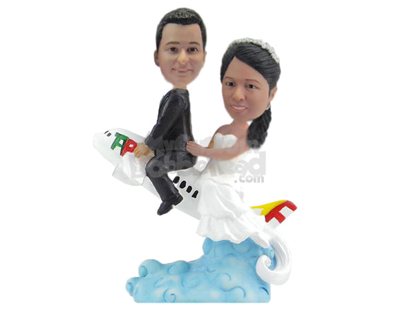 Custom Bobblehead Wedding Couple Off To Their Honeymoon Sitting Over A Plane - Wedding & Couples Bride & Groom Personalized Bobblehead & Cake Topper