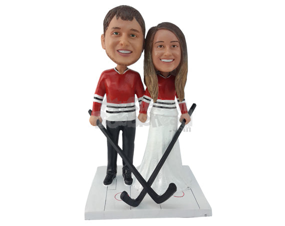 Ice Hockey Couple with Their Sticks and Jerseys Embedded to Their Fancy Gown and Suit Personalized Bobblehead