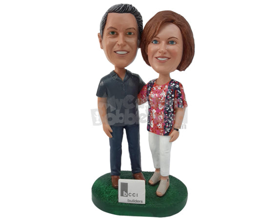 Custom Bobblehead Builder Couple Standing Next To Their Board While Putting Hands On Each Other Shoulders - Wedding & Couples Couple Personalized Bobblehead & Cake Topper