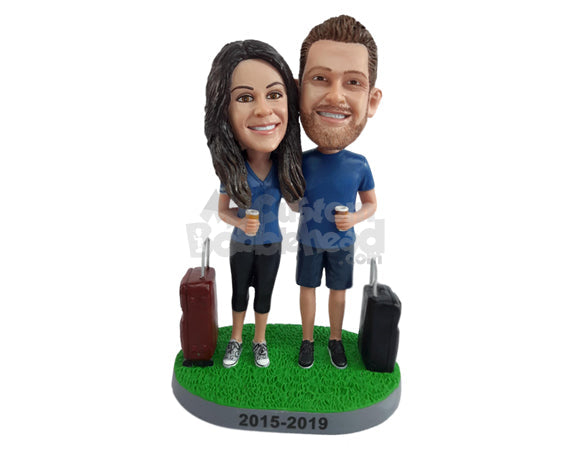 Sport Fan Couple Who Have Traveled with Their Trolley Bags Next to Them Personalized Bobblehead