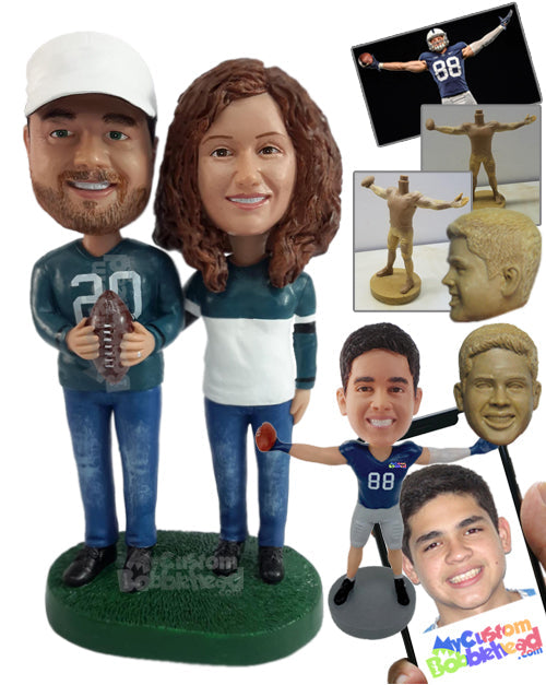 Sporty couple wearing their team's jerseys, holding a ball Personalized Bobblehead