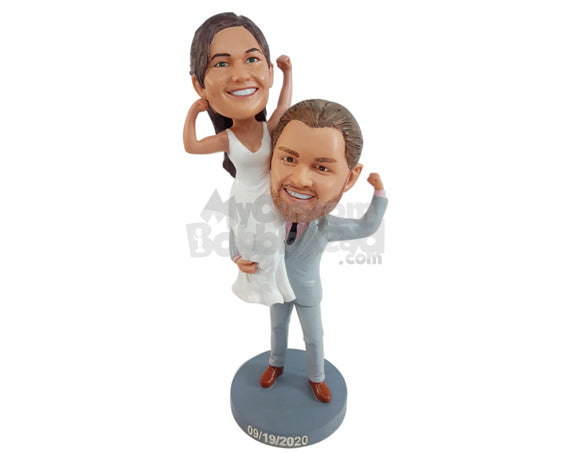 Custom Bobblehead Super strong Groom holding the Bride over the shoulder wearng gorgeous clothes - Wedding & Couples Bride & Groom Personalized Bobblehead & Action Figure