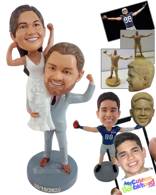 Super strong Groom holding the Bride over the shoulder wearng gorgeous clothes Personalized Bobblehead