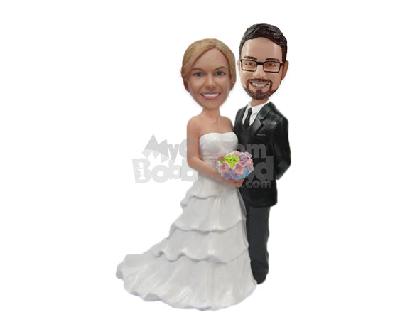 Lovely Wedding Couple In Wedding Attire Standing Together With A Bouquet Personalized Bobblehead