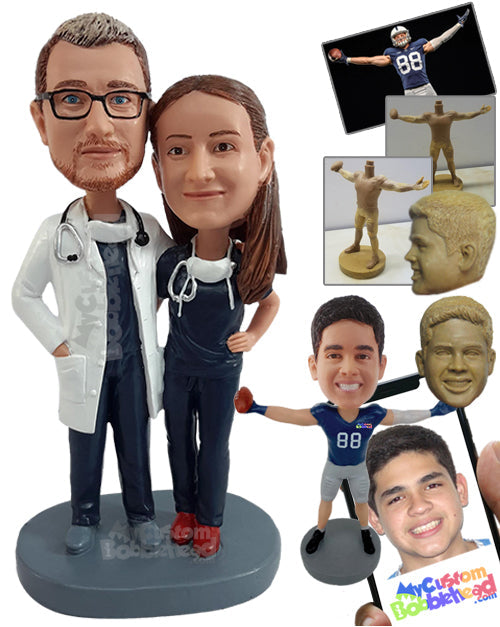 Medical doctor couple wearing medical attire and lab coats with stethoscopes Personalized Bobblehead