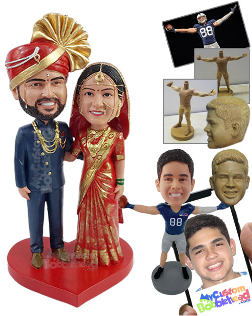 Traditional looking couple wearing nice suit and sari with nice jewelry on Personalized Bobblehead