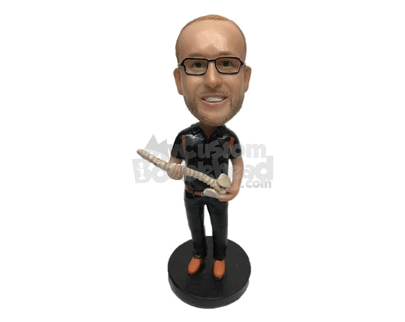 Chiropractor in Medical Attire Holding A Spine in Hand Personalized Bobblehead