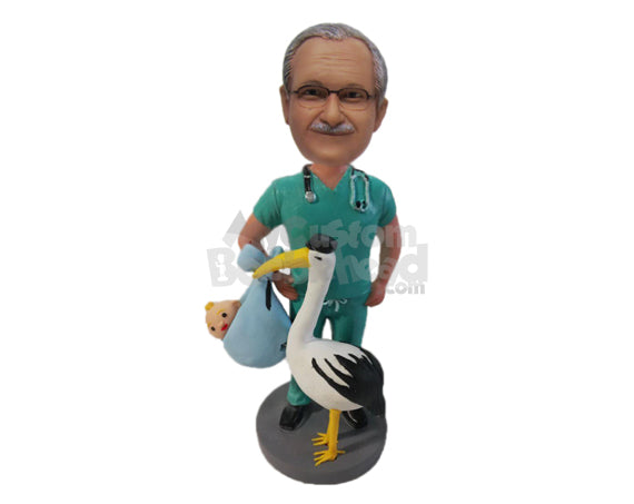 Custom Bobblehead Gynecologist Doctor In Medical Attire And Stork Holding A Newborn Baby - Careers & Professionals Medical Doctors Personalized Bobblehead & Cake Topper