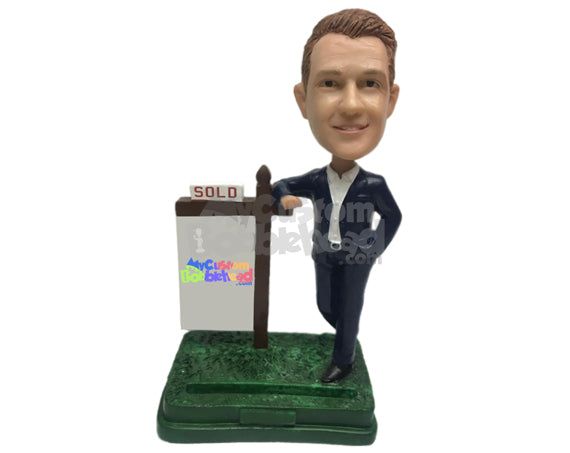 Male Real Estate Agent Wearing a Stylish Suit and Leaning against the Sign Personalized Bobblehead