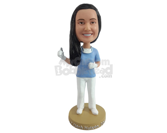 Custom Bobblehead Nice young dentist holding a pulling tool with a face mask on the neck - Careers & Professionals Dentists Personalized Bobblehead & Action Figure