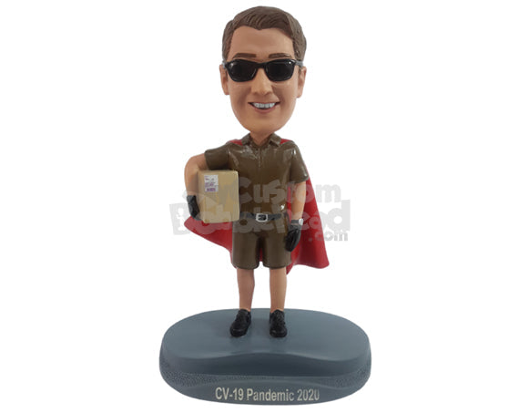 Super Cool package carrier holdinf a package box and wearing a cape with a phone holder base Personalized Bobblehead