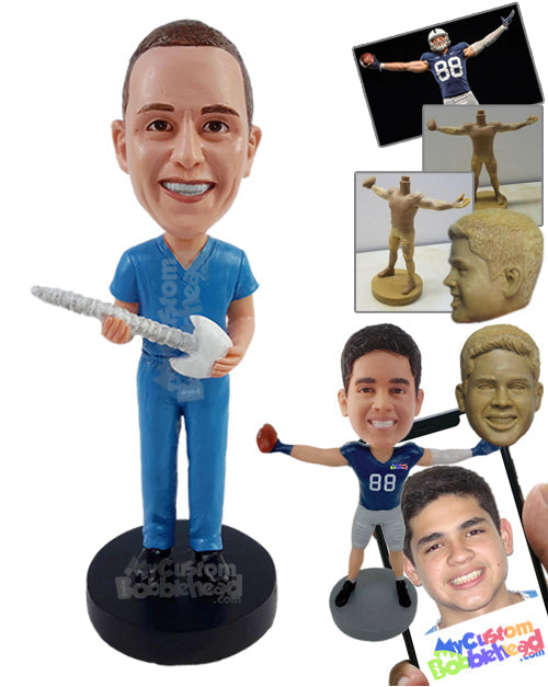 Chiropractor in Scrubs Holding a Spine Personalized Bobblehead