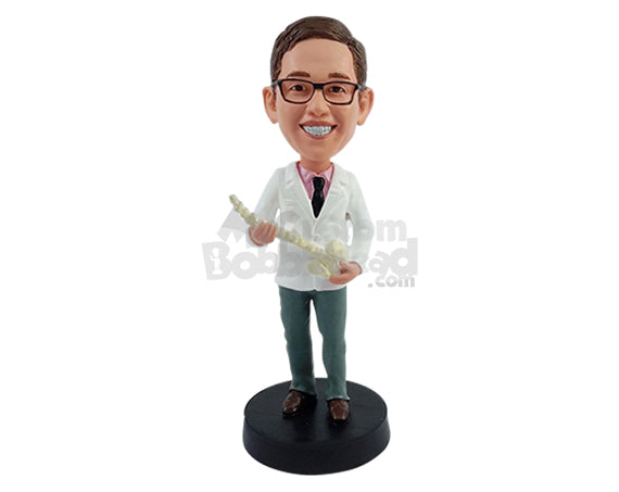 Custom Bobblehead Young Chiropractor graduate showing a model medule wearing a short lab coat and tie - Careers & Professionals Chiropractors Personalized Bobblehead & Action Figure