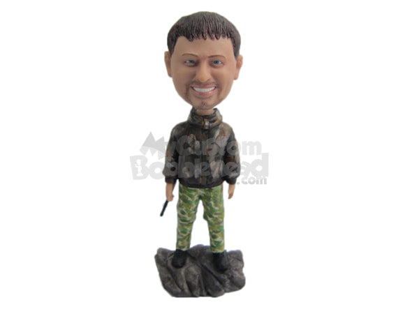 Custom Bobblehead Hunter Wearing A Camouflage Jacket Standing Over Rock - Sports & Hobbies Fishing Personalized Bobblehead & Cake Topper