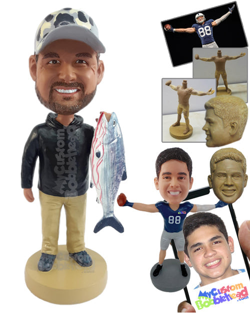 Stylish fisherman holding a big fish in one hand Personalized Bobblehead