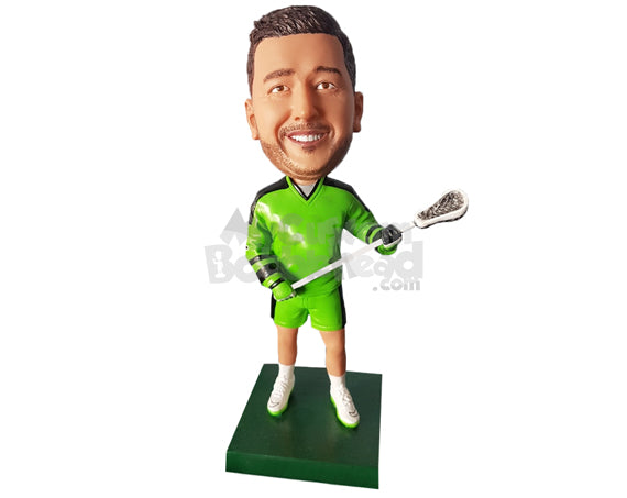 Male lacrosse player wearing his uniform with a long sleeve jersey and holding his lacrosse stick Personalized Bobblehead