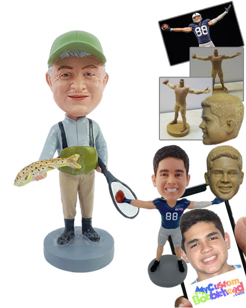 Old fisherman guy holding a fish in one hand and a tennis racket in the other Personalized Bobblehead