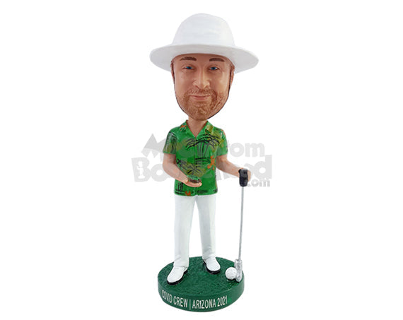 Vacational golfer player wearing a nice Hawaiian shirt and pants holding a patch of grass Personalized Bobblehead