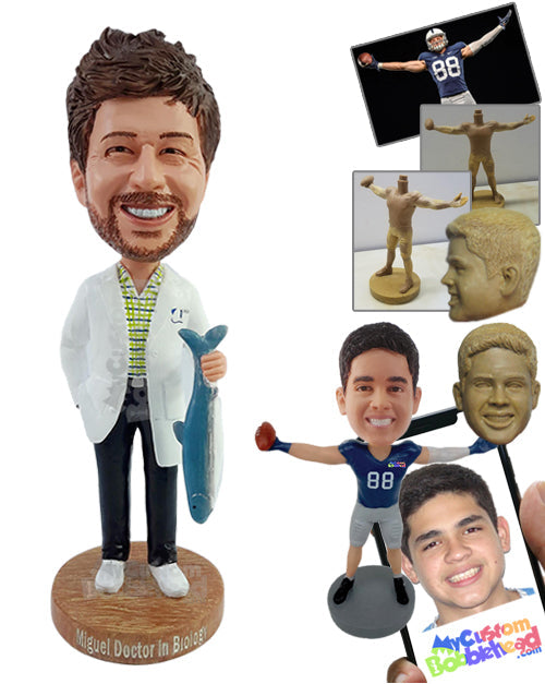 Male doctor fishing lover holding a fish, wearing doctor clothes, with one hand inside pocket Personalized Bobblehead