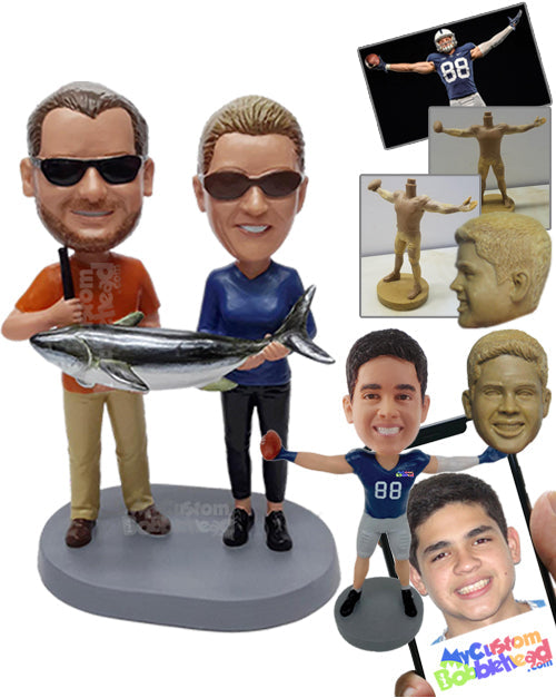 Fishing Couple Holding a Huge Fish, Wearing Casual Sporty Clothes Personalized Bobblehead