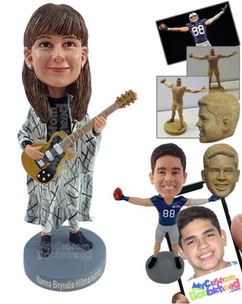 Nice looking gal wearing trendy outfit playing the guitar Personalized Bobblehead