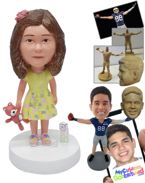 Little girl playing with her teddy bear and blocks, wearing a gorgeous dress and cool shoes Personalized Bobblehead