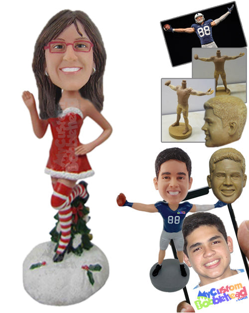 Lady in Strapless Santa Dress and Long Socks Waving Hello with One Leg in the Air Personalized Bobblehead